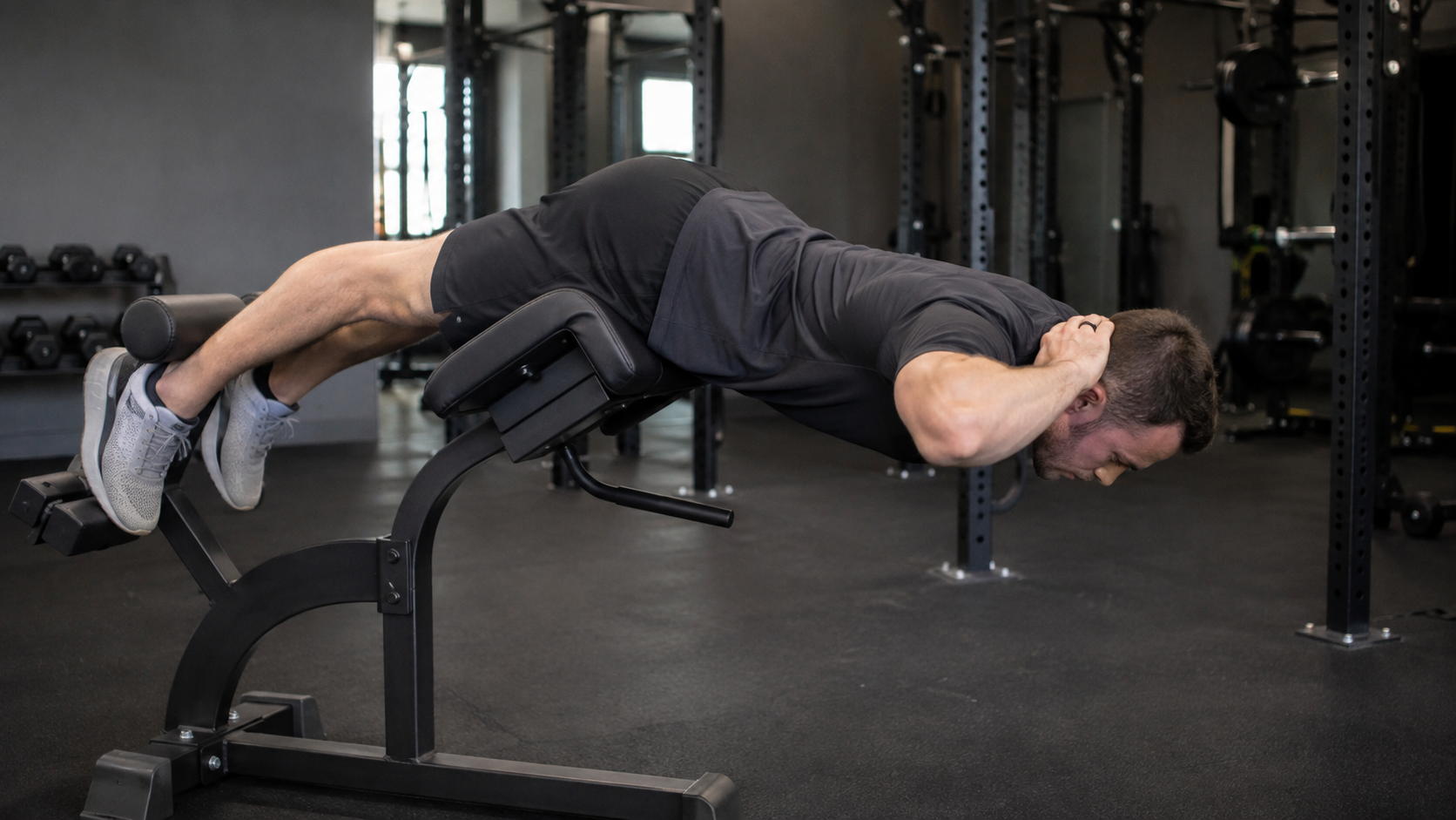 Person doing a back extension on a Roman chair, side view